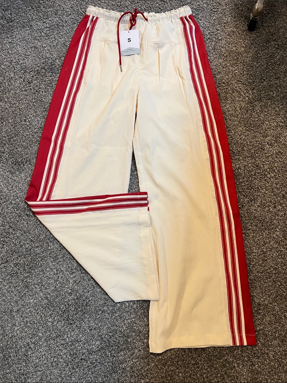 Cream Track Pants with Red Side Stripes